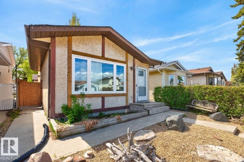 Exterior Front of House with North Facing Front Yard and quiet street in front. - 18655 61 Avenue, Edmonton, AB - Outdoor