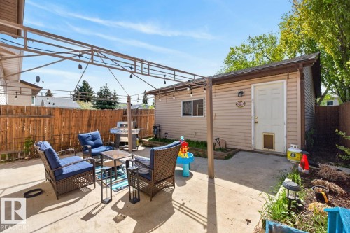South Facing Backyard featuring Gazebo and Patio. Low maintenance and ready for Summer! - 18655 61 Avenue, Edmonton, AB - Outdoor With Exterior