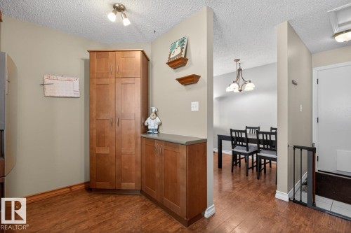 Kitchen featuring Stainless Steel Appliances, Ample Cabinets, Counter Space, and Storage with South Facing Window overlooking your Private Backyard. - 18655 61 Avenue, Edmonton, AB - Indoor Photo Showing Other Room