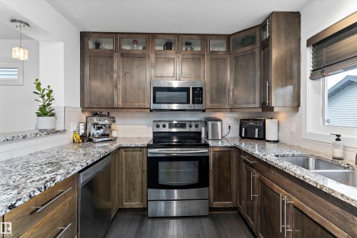 6904 Cardinal Wynd, Edmonton, AB - Indoor Photo Showing Kitchen With Stainless Steel Kitchen With Double Sink
