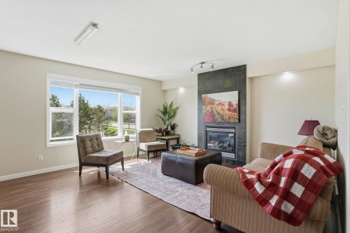 10 Rockwell Close, Fort Saskatchewan, AB - Indoor Photo Showing Living Room With Fireplace