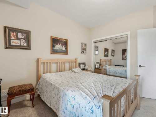 Image quality insufficient for description - 213 625 Leger Way, Edmonton, AB - Indoor Photo Showing Bedroom