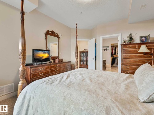 Image quality insufficient for description - 213 625 Leger Way, Edmonton, AB - Indoor Photo Showing Bedroom