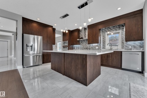 4902 38 Street, Beaumont, AB - Indoor Photo Showing Kitchen With Stainless Steel Kitchen With Upgraded Kitchen