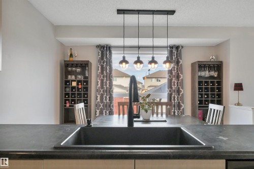 18 Southwick Point(E), Leduc, AB - Indoor Photo Showing Kitchen With Double Sink
