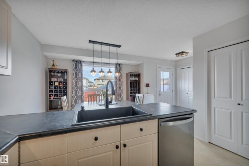18 Southwick Point(E), Leduc, AB - Indoor Photo Showing Kitchen With Double Sink