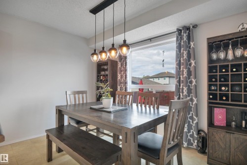 18 Southwick Point(E), Leduc, AB - Indoor Photo Showing Dining Room