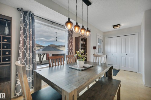 18 Southwick Point(E), Leduc, AB - Indoor Photo Showing Dining Room