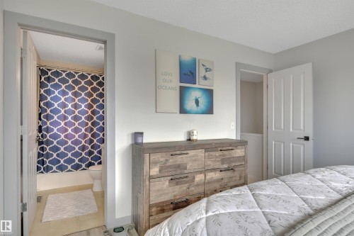 18 Southwick Point(E), Leduc, AB - Indoor Photo Showing Bedroom