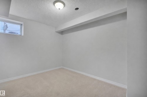 18 Southwick Point(E), Leduc, AB - Indoor Photo Showing Other Room