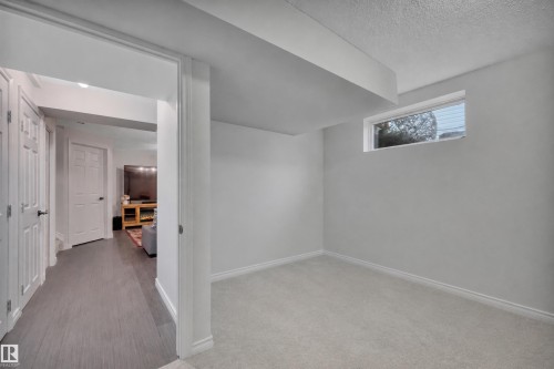 18 Southwick Point(E), Leduc, AB - Indoor Photo Showing Other Room