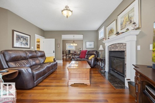 11137 81 Avenue, Edmonton, AB - Indoor Photo Showing Living Room With Fireplace