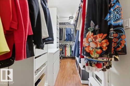The walk-in closet for the primary bedroom, with a window for natural light. - 11137 81 Avenue, Edmonton, AB - Indoor With Storage