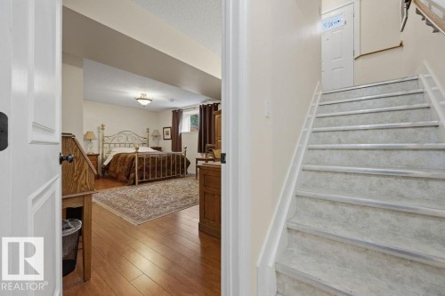 Basement stairs and landing. - 11137 81 Avenue, Edmonton, AB - Indoor Photo Showing Other Room