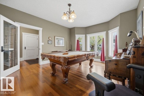 Main floor bedroom that also makes for an excellent den. - 11137 81 Avenue, Edmonton, AB - Indoor Photo Showing Other Room