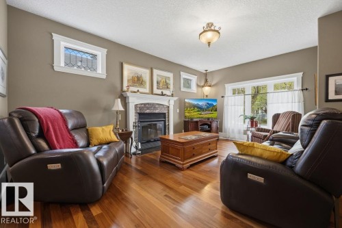 11137 81 Avenue, Edmonton, AB - Indoor Photo Showing Living Room With Fireplace