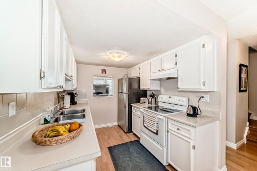 18 10453 20 Avenue, Edmonton, AB - Indoor Photo Showing Kitchen With Double Sink