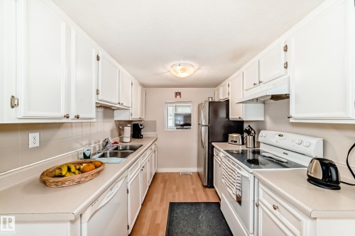 18 10453 20 Avenue, Edmonton, AB - Indoor Photo Showing Kitchen With Double Sink