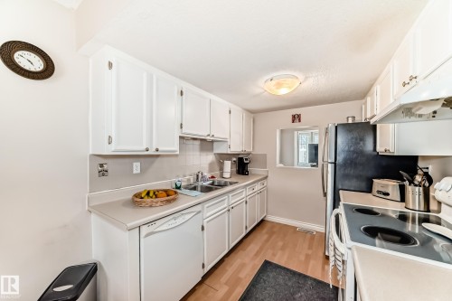 18 10453 20 Avenue, Edmonton, AB - Indoor Photo Showing Kitchen With Double Sink