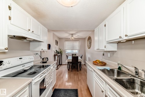 18 10453 20 Avenue, Edmonton, AB - Indoor Photo Showing Kitchen With Double Sink