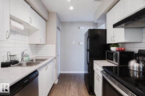 8 14110 80 Street, Edmonton, AB - Indoor Photo Showing Kitchen With Double Sink