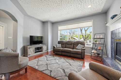 8612 108A Street, Edmonton, AB - Indoor Photo Showing Living Room With Fireplace