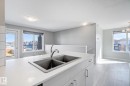 20 1530 Tamarack Boulevard, Edmonton, AB  - Indoor Photo Showing Kitchen With Double Sink 