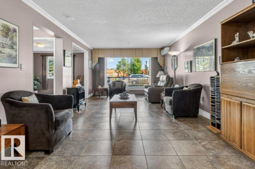 Open concept living area. - 101 10903 21 Avenue Nw, Edmonton, AB - Indoor Photo Showing Living Room