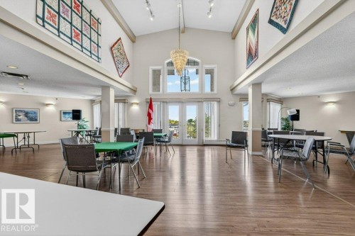 Here you can play cards or enjoy the occasional dinner with everyone.  This room can also be rented out for special occasions with your family. - 101 10903 21 Avenue Nw, Edmonton, AB - Indoor Photo Showing Dining Room