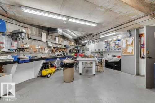 Another view of all that is available in the workshop. - 101 10903 21 Avenue Nw, Edmonton, AB - Indoor