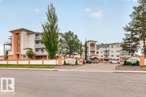Lovely gated entrance into the complex. - 101 10903 21 Avenue Nw, Edmonton, AB - Outdoor With Facade