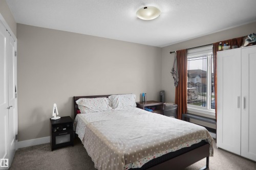 Light-toned walls with contrasting white trim throughout - 6108 173 Ave, Edmonton, AB 