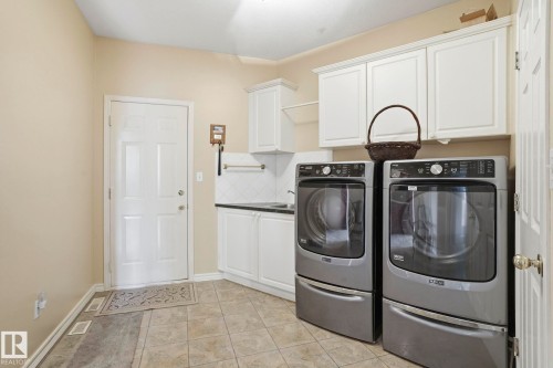 7 J. Brown Place, Leduc, AB - Indoor Photo Showing Laundry Room