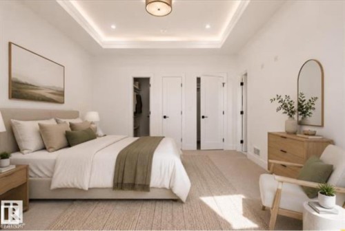 Recessed lighting in a tray ceiling, contemporary lighting fixture, white paneled doors with black hardware, and neutral-toned carpeting - 4727 17 Avenue, Edmonton, AB 