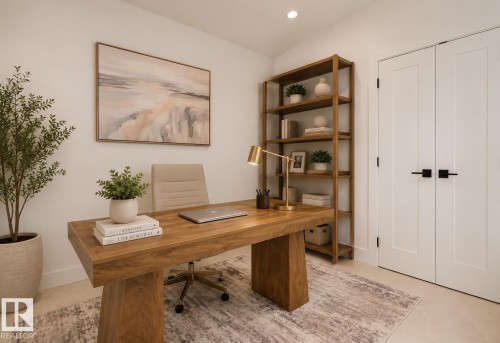 Dedicated room featuring a warm wood-finish desk, an open shelving unit, recessed lighting, and a neutral color palette - 4727 17 Avenue, Edmonton, AB - Indoor Photo Showing Office