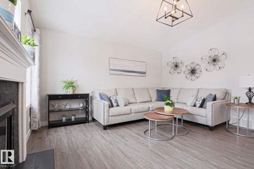 53 Newport Crescent, St. Albert, AB - Indoor Photo Showing Living Room With Fireplace