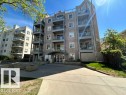 "Savoy" condominium building featuring multiple levels of private balconies with glass railings - 304 10011 110 Street, Edmonton, AB  - Outdoor With Facade 