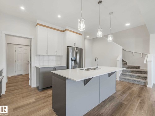 20723 24 Avenue, Edmonton, AB - Indoor Photo Showing Kitchen With Double Sink With Upgraded Kitchen