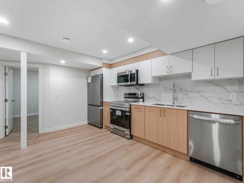 20723 24 Avenue, Edmonton, AB - Indoor Photo Showing Kitchen With Double Sink