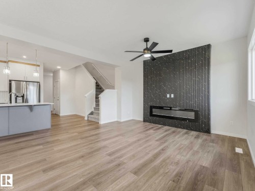 20723 24 Avenue, Edmonton, AB - Indoor Photo Showing Other Room With Fireplace