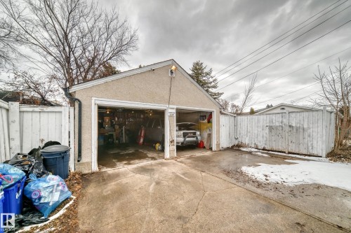 Detached garage with two bays and a concrete driveway - 7723 82 Avenue, Edmonton, AB - Outdoor