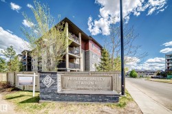 Heritage Valley Station II building featuring multi-level units with private balconies - 