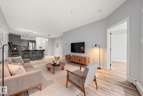 306 10611 117 Street, Edmonton, AB - Indoor Photo Showing Living Room