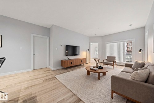 306 10611 117 Street, Edmonton, AB - Indoor Photo Showing Living Room