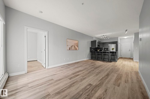 306 10611 117 Street, Edmonton, AB - Indoor Photo Showing Living Room