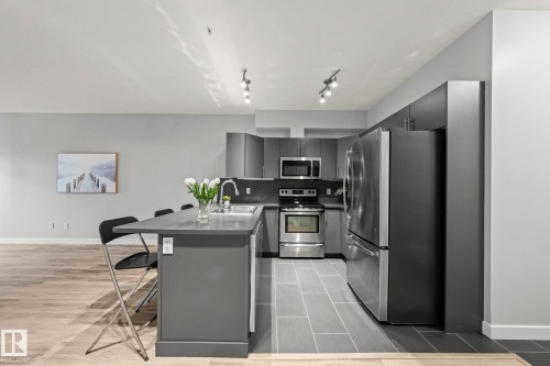 306 10611 117 Street, Edmonton, AB - Indoor Photo Showing Kitchen With Stainless Steel Kitchen