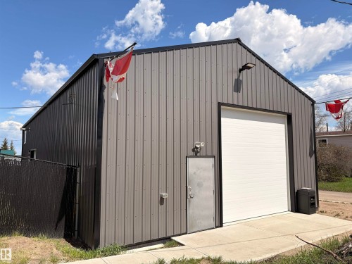Modern commercial building featuring durable corrugated metal siding - 5510 Railway Avenue, Glendon, AB - Outdoor With Exterior