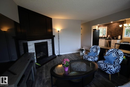 44 Wellington Crescent, Spruce Grove, AB - Indoor Photo Showing Living Room With Fireplace