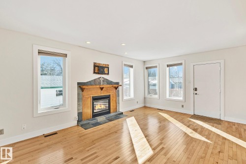10823 130 Street, Edmonton, AB - Indoor Photo Showing Living Room With Fireplace