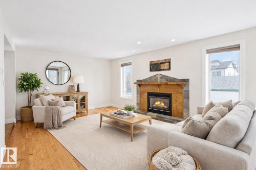 10823 130 Street, Edmonton, AB - Indoor Photo Showing Living Room With Fireplace